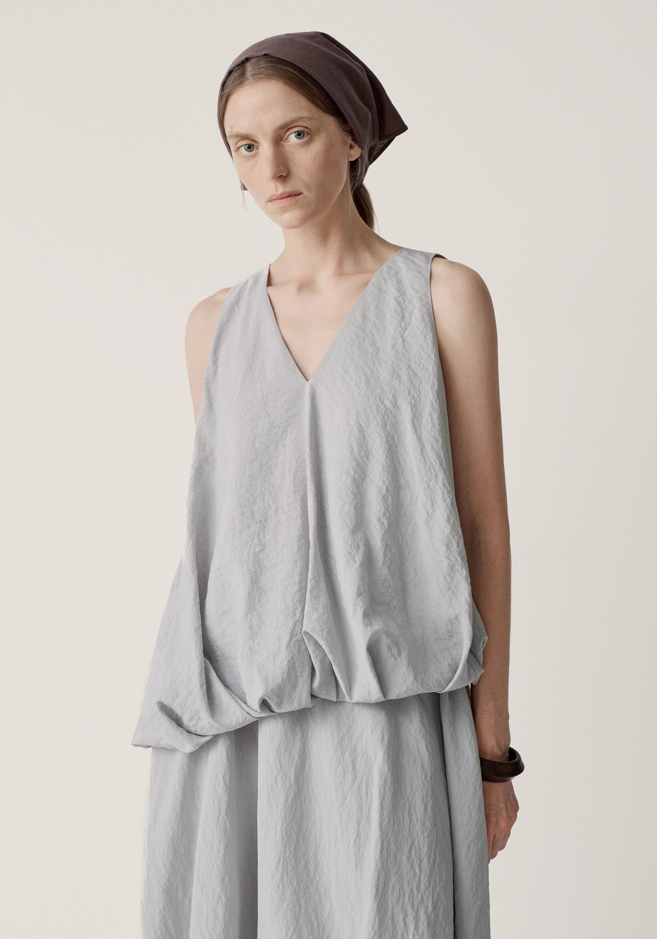 Sleeveless Puff Twist Top